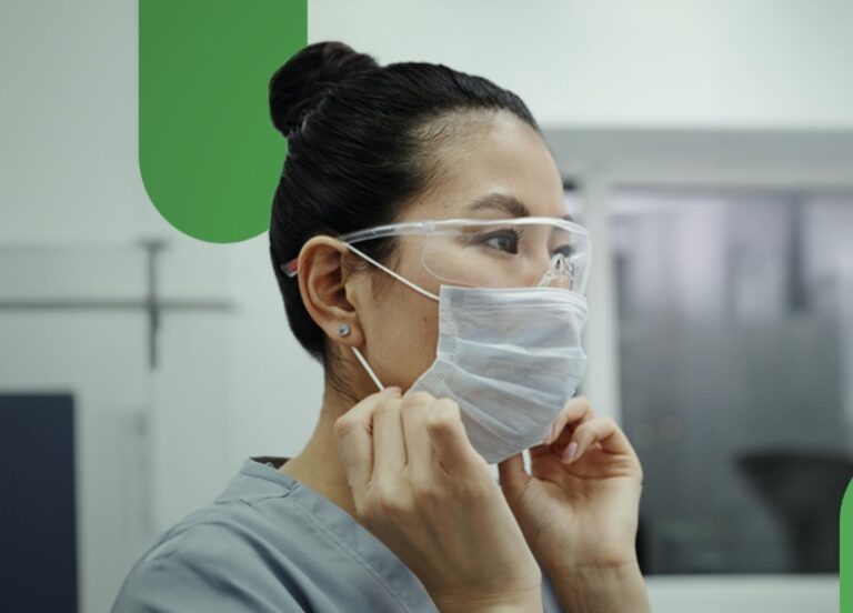 Decorative image of medical professional adjusting face mask